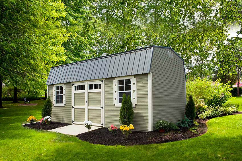 <li>Wild Grasses color Dutchlap siding,
Navajo White color Trim,
Charcoal color Roof,
Wooden Double doors with Transom Windows and Garden arches,
24 x 36 windows with Navajo White color Decorative Star shutters</li>