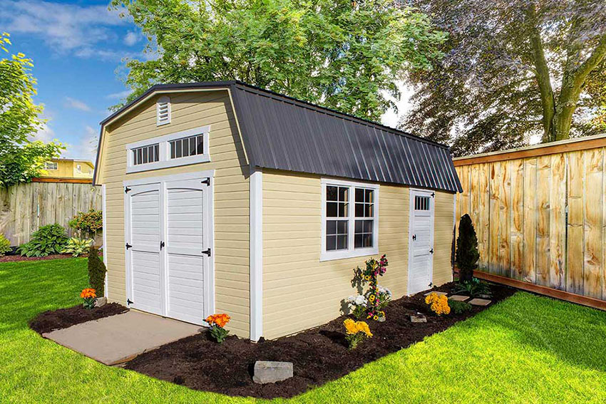 <li>Zook Cream color Dutchlap siding,
Barn white color Trim and doors,
Charcoal color Roof,
Wooden Double doors with Garden arch,
Single door with Transom window,
Double 24 x 36 windows and one double Transom window,
Eave Overhang on the roof above the doors</li>