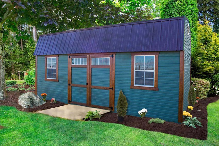 <li>Pequea Green color Dutchlap siding,
LP Chestnut stain trim,
Burnside Slate roof,
Wooden double doors with Transom windows,
24 x 36 windows</li>